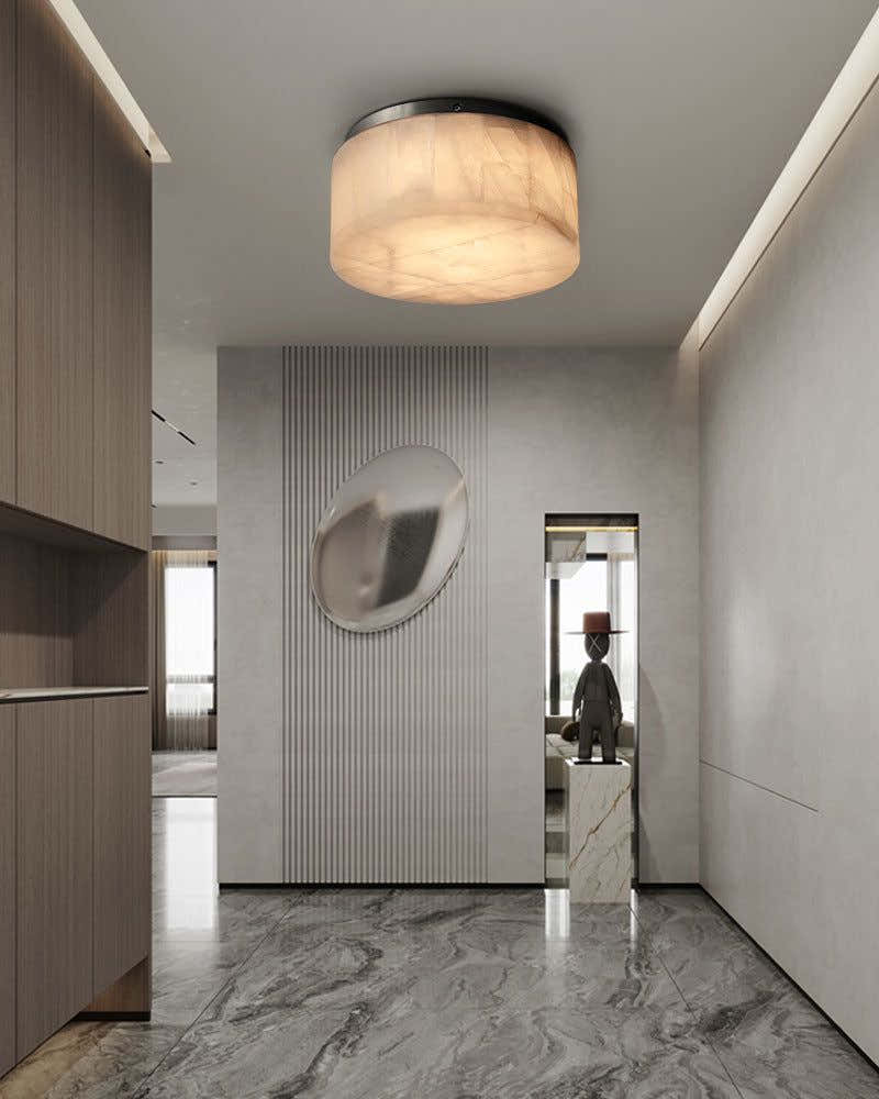 Round Alabaster flush mount ceiling light in brass frame for bedroom