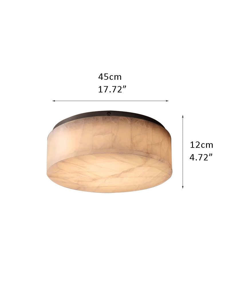 Round Alabaster flush mount ceiling light in brass frame for bedroom